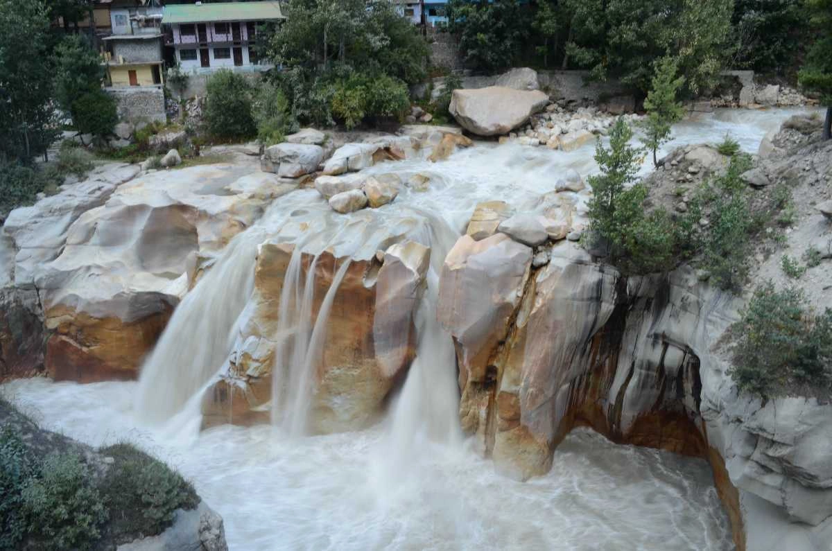 Gangotri Temple near the glacier with flowing Ganga River and Himalayan landscape