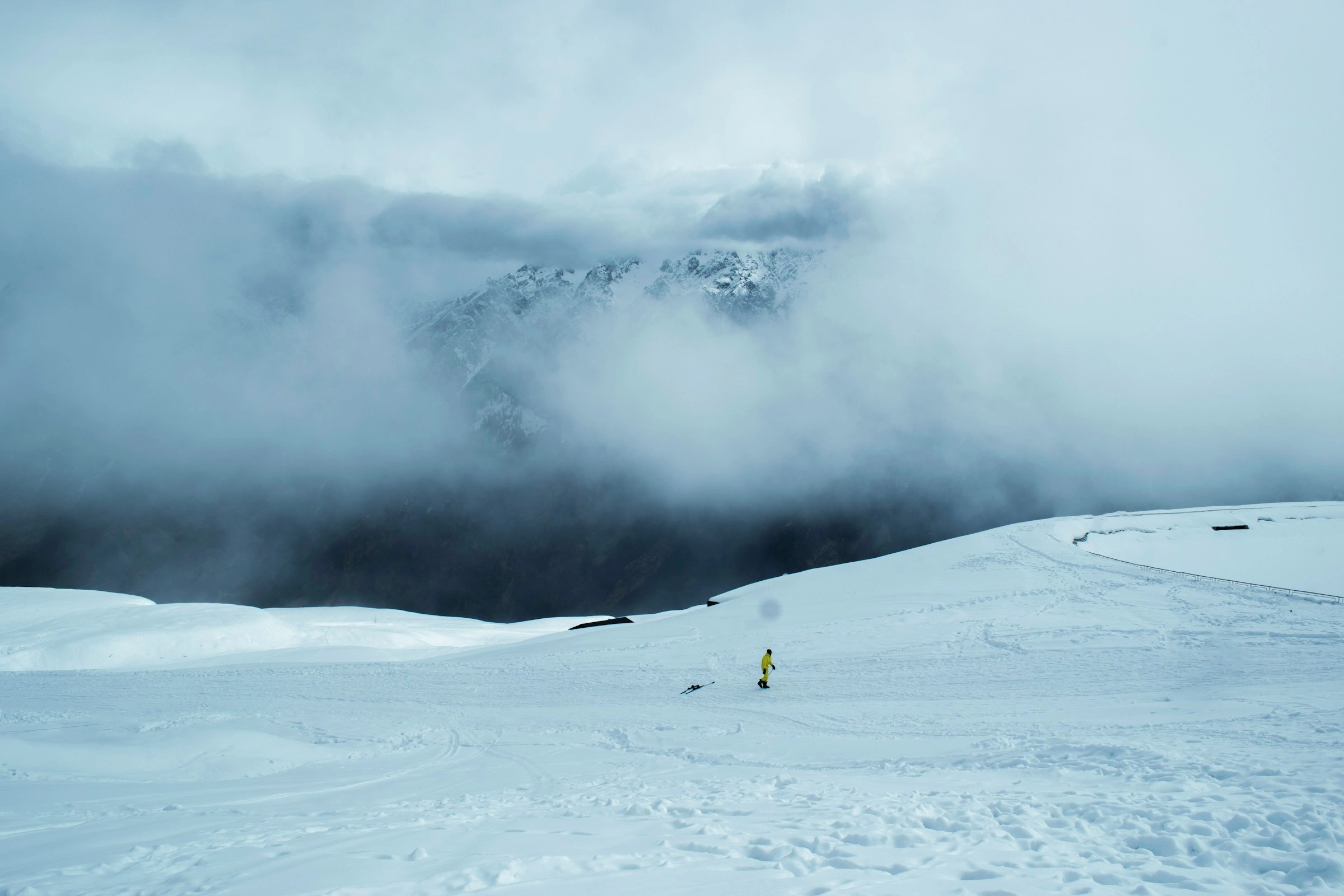 Snow covered Auli hills with Himalayan mountain backdrop