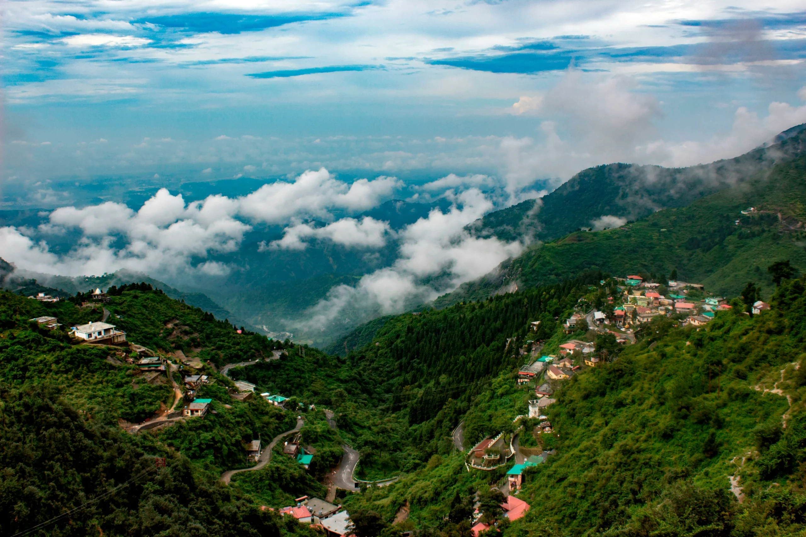 Misty hills and lush greenery in Mussoorie Uttarakhand